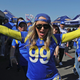 A Los Angeles Rams fan poses outside the stadium before the NFC Championship Game against the San Francisco 49er.
